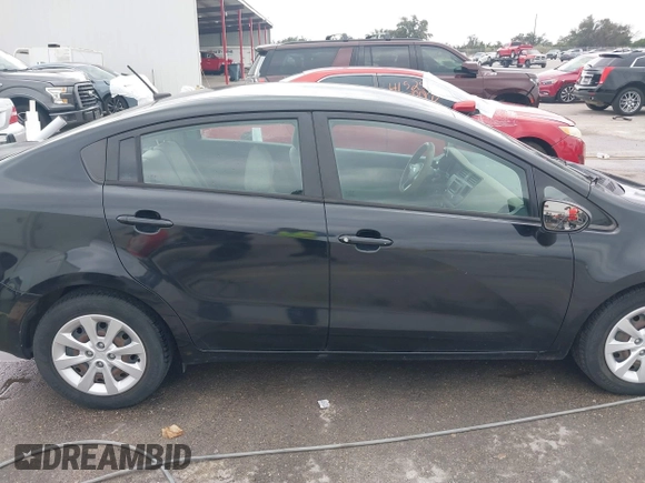 2015 Kia Rio LX with VIN KNADM4A39F6440291, listed as a IAAI auction lot 41532881 with 97,238 mi miles. Bid and sale history available at carsss.com. Image 14.