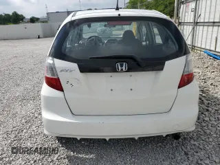 2013 Honda Fit с VIN JHMGE8H36DC045573, выставлен на аукционе Copart как лот 59525075 с пробегом 91 355 миль миль и Списание • Salvage title. История ставок и продаж доступна на DreamBid. Изображение 6.