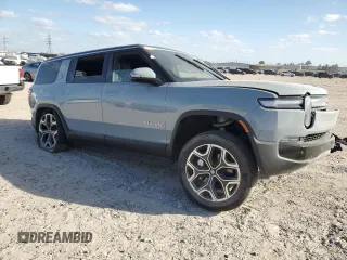 2025 Rivian R1S Adventure z VIN 7PDSGBBA5SN045424, wystawiony jako Copart lot #49675655 z przebiegiem Nie podano mil oraz Szkoda całkowita • Salvage title. Historia ofert i sprzedaży dostępna na DreamBid. Obrazek 4.
