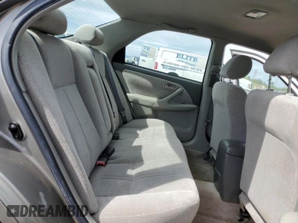 2001 Toyota Camry LE z VIN JT2BF22K310338343, wystawiony jako Copart lot #45181715 z przebiegiem 183 500 mil mil oraz Szkoda całkowita • Salvage title. Historia ofert i sprzedaży dostępna na DreamBid. Obrazek 10.
