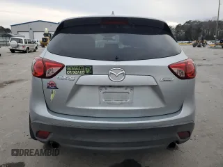 2016 Mazda CX-5 Touring with VIN JM3KE2CY1G0884474, listed as a Copart auction lot 41910975 with 106,120 mi miles and Salvage Title. Bid and sale history available at carsss.com. Image 6.
