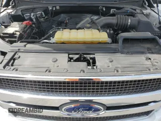 2019 Ford F-150 XL with VIN 1FTEW1E51KFB58751, listed as a Copart auction lot 50058755 with 102,411 mi miles and Salvage Title. Bid and sale history available at carsss.com. Image 11.