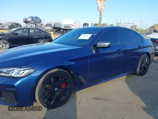 2021 BMW 5 Series M550i xDrive z VIN WBA13BK0XMCG75802, wystawiony jako IAAI lot #41503977 z przebiegiem 20 741 mil mil oraz . Historia ofert i sprzedaży dostępna na DreamBid. Obrazek 14.