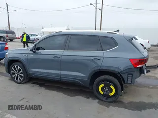 2022 Volkswagen Taos SE z VIN 3VVRX7B21NM007085, wystawiony jako IAAI lot #42018520 z przebiegiem 27 904 mil mil oraz . Historia ofert i sprzedaży dostępna na DreamBid. Obrazek 14.