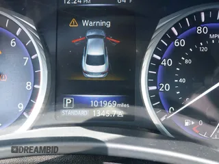 2015 Infiniti Q50 Premium with VIN JN1BV7AR2FM411095, listed as a IAAI auction lot 41932965 with 101,969 mi miles. Bid and sale history available at carsss.com. Image 16.