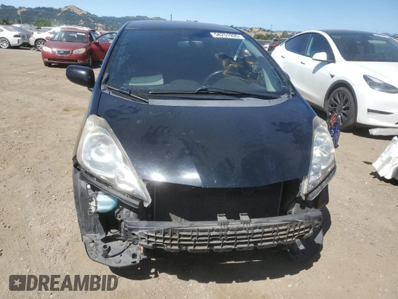 2011 Honda Fit Sport z VIN JHMGE8H51BC017985, wystawiony jako Copart lot #58251935 z przebiegiem 178 370 mil mil oraz Szkody całkowita. Historia ofert i sprzedaży dostępna na DreamBid. Obrazek 5.