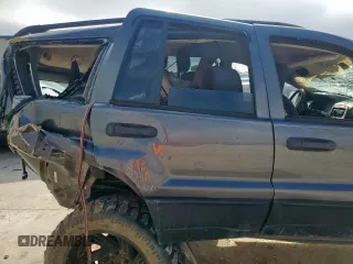 2003 Jeep Grand Cherokee Laredo with VIN 1J4GX48S63C604527, listed as a Copart auction lot 55996725 with Not provided miles and Non repairable. Bid and sale history available at DreamBid. Image 11.