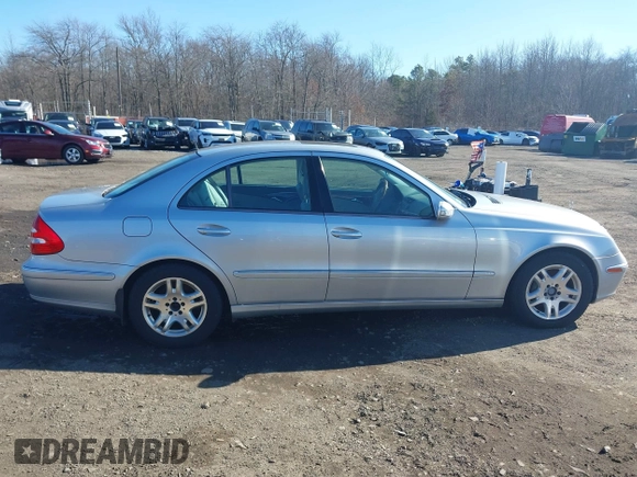 2006 Mercedes-Benz E-Class 3.5L with VIN WDBUF56J06A737827, listed as a IAAI auction lot 41748739 with 197,843 mi miles. Bid and sale history available at carsss.com. Image 13.