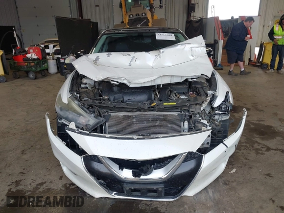 2016 Nissan Maxima SL z VIN 1N4AA6APXGC383444, wystawiony jako IAAI lot #41766069 z przebiegiem 92 629 mil mil oraz . Historia ofert i sprzedaży dostępna na DreamBid. Obrazek 13.