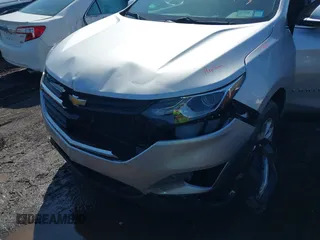 2019 Chevrolet Equinox LT with VIN 3GNAXUEV5KS670478, listed as a IAAI auction lot 41745218 with 56,996 mi miles and . Bid and sale history available at DreamBid. Image 6.