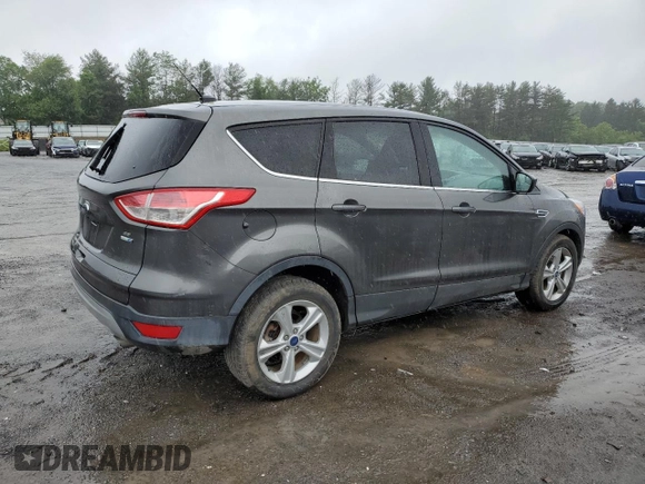 2016 Ford Escape SE z VIN 1FMCU9GX6GUA02410, wystawiony jako Copart lot #58623545 z przebiegiem 106 992 mil mil oraz Tytuł czysty. Historia ofert i sprzedaży dostępna na DreamBid. Obrazek 3.