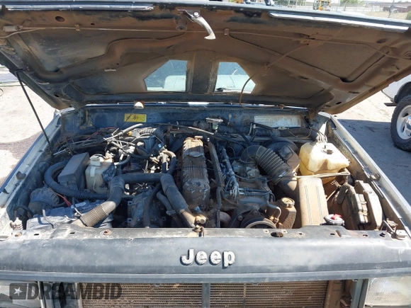 1995 Jeep Cherokee Sport with VIN 1J4FJ68S5SL541413, listed as a IAAI auction lot 42722408 with 335,432 mi miles and . Bid and sale history available at DreamBid. Image 10.