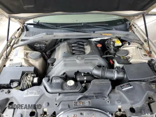 2003 Jaguar S-Type z VIN SAJEA01U53HM58399, wystawiony jako Copart lot #62006044 z przebiegiem 86 841 mil mil oraz Szkoda całkowita • Salvage title. Historia ofert i sprzedaży dostępna na DreamBid. Obrazek 11.