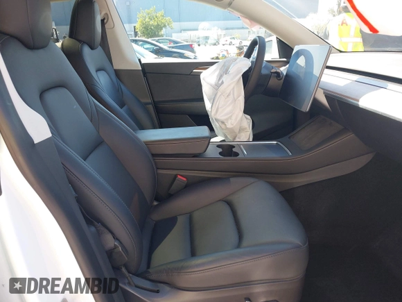 2023 Tesla Model Y Long Range with VIN 7SAYGDEE2PF696336, listed as a IAAI auction lot 41894686 with 34,203 mi miles. Bid and sale history available at carsss.com. Image 5.