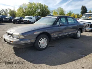 1993 Oldsmobile 88 z VIN 1G3HN53L4PH310087, wystawiony jako Copart lot #75523874 z przebiegiem 151 178 mil mil oraz Tytuł czysty. Historia ofert i sprzedaży dostępna na DreamBid. Obrazek 1.