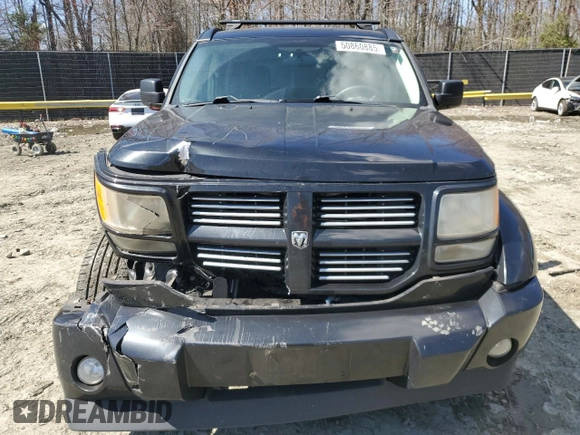 2011 Dodge Nitro Heat z VIN 1D4PU4GK7BW605931, wystawiony jako Copart lot #50860885 z przebiegiem 149 697 mil mil oraz Szkoda całkowita • Salvage title. Historia ofert i sprzedaży dostępna na DreamBid. Obrazek 5.