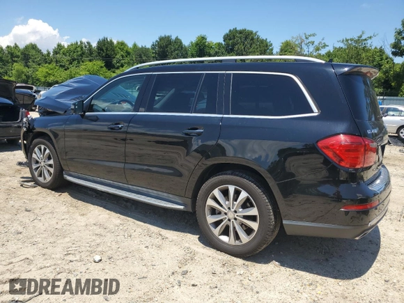 2015 Mercedes-Benz GL with VIN 4JGDF6EE1FA562088, listed as a Copart auction lot 58736934 with 104,550 mi miles and Salvage Title. Bid and sale history available at carsss.com. Image 2.