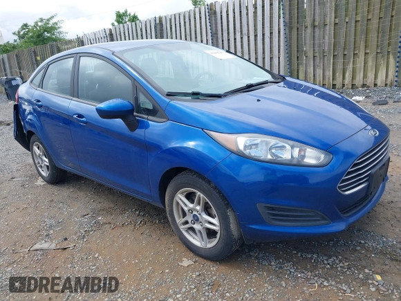 2018 Ford Fiesta SE z VIN 3FADP4BJXJM126168, wystawiony jako IAAI lot #42255261 z przebiegiem 121 248 mil mil oraz . Historia ofert i sprzedaży dostępna na DreamBid. Obrazek 1.
