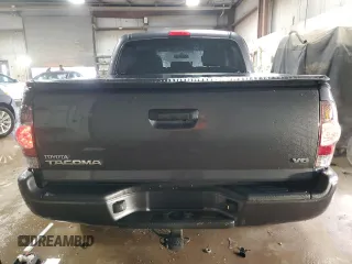 2014 Toyota Tacoma with VIN 5TFLU4ENXEX089927, listed as a Copart auction lot 52140565 with 112,924 mi miles and Salvage Title. Bid and sale history available at DreamBid. Image 6.