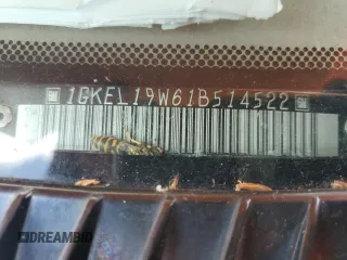2001 GMC Safari z VIN 1GKEL19W61B514522, wystawiony jako Copart lot #57143155 z przebiegiem Nie podano mil oraz Szkody całkowita. Historia ofert i sprzedaży dostępna na DreamBid. Obrazek 13.