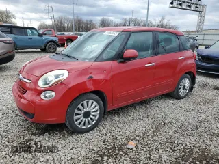 2014 FIAT 500L Easy with VIN ZFBCFABH7EZ002869, listed as a Copart auction lot 50063045 with 100,438 mi miles and Salvage Title. Bid and sale history available at DreamBid. Image 1.