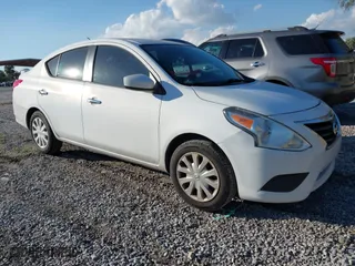 2015 Nissan Versa SV with VIN 3N1CN7AP5FL888374, listed as a IAAI auction lot 41559820 with 135,218 mi miles. Bid and sale history available at carsss.com. Image 1.