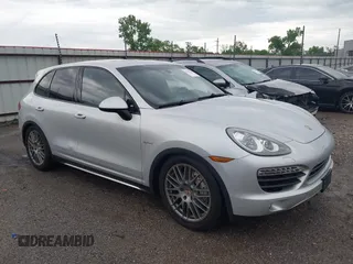 2014 Porsche Cayenne S Hybrid with VIN WP1AE2A23ELA50672, listed as a IAAI auction lot 42137963 with 113,006 mi miles and . Bid and sale history available at DreamBid. Image 1.