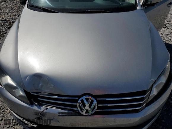 2012 Volkswagen Passat SE z VIN 1VWBH7A39CC092065, wystawiony jako Copart lot #52719595 z przebiegiem 161 991 mil mil oraz Szkoda całkowita • Salvage title. Historia ofert i sprzedaży dostępna na DreamBid. Obrazek 11.