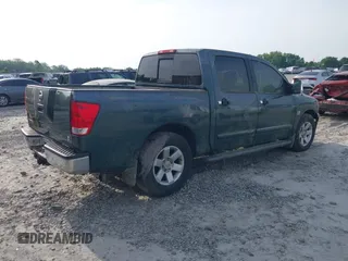 2004 Nissan Titan LE with VIN 1N6AA07A84N549757, listed as a IAAI auction lot 42083786 with 313,053 mi miles and . Bid and sale history available at DreamBid. Image 4.