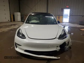 2021 Tesla Model 3 Standard Range Plus with VIN 5YJ3E1EA5MF987000, listed as a Copart auction lot 87638485 with Not Provided miles and Salvage Title. Bid and sale history available at DreamBid. Image 5.