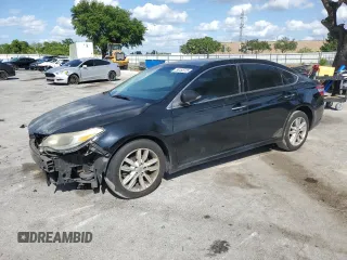 2013 Toyota Avalon XLE with VIN 4T1BK1EB2DU019243, listed as a Copart auction lot 55155725 with 256,267 mi miles and Salvage Title. Bid and sale history available at DreamBid. Image 1.