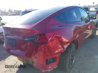2025 Tesla Model Y Long Range with VIN 7SAYGDED8SF223993, listed as a IAAI auction lot 41743146 with 4,866 mi miles and . Bid and sale history available at DreamBid. Image 6.