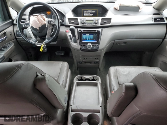 2016 Honda Odyssey Touring Elite with VIN 5FNRL5H97GB090094, listed as a Copart auction lot 50545285 with 158,334 mi miles and Salvage Title. Bid and sale history available at DreamBid. Image 8.