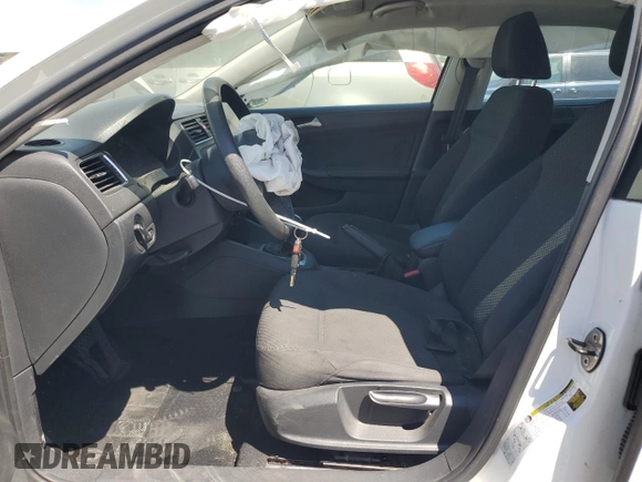 2014 Volkswagen Jetta S with VIN 3VW2K7AJ2EM303673, listed as a Copart auction lot 62909235 with 69,592 mi miles and Salvage title. Bid and sale history available at DreamBid. Image 7.