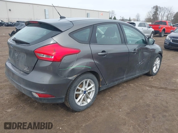 2015 Ford Focus SE with VIN 1FADP3K27FL303111, listed as a IAAI auction lot 41802182 with 195,834 mi miles and . Bid and sale history available at DreamBid. Image 4.