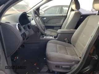 2006 Ford Freestyle SE with VIN 1FMZK011X6GA30322, listed as a Copart auction lot 77874104 with 249,188 mi miles and Salvage Title. Bid and sale history available at carsss.com. Image 7.