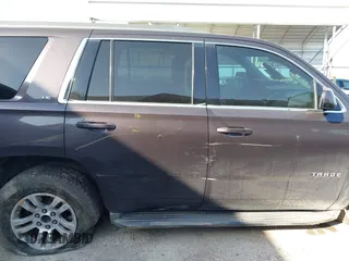 2015 Chevrolet Tahoe LS z VIN 1GNSCAKCXFR628303, wystawiony jako IAAI lot #42002698 z przebiegiem 152 141 mil mil oraz . Historia ofert i sprzedaży dostępna na DreamBid. Obrazek 13.