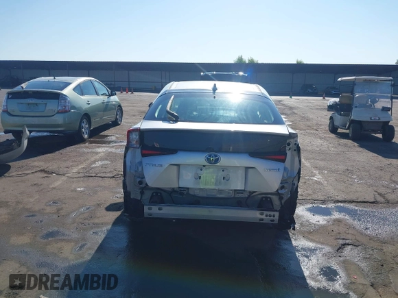 2021 Toyota Prius L Eco with VIN JTDKAMFU7M3142616, listed as a IAAI auction lot 42755833 with 40,542 mi miles and . Bid and sale history available at DreamBid. Image 17.