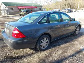 2005 Ford Five Hundred SE z VIN 1FAFP231X5G145153, wystawiony jako IAAI lot #42059747 z przebiegiem 59 114 mil mil oraz . Historia ofert i sprzedaży dostępna na DreamBid. Obrazek 4.