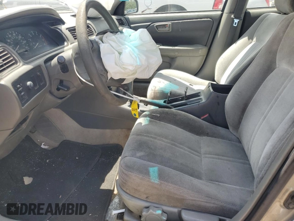 1998 Toyota Camry LE с VIN JT2BG22K8W0122346, выставлен на аукционе Copart как лот 56286295 с пробегом Не указан миль и Списание • Salvage title. История ставок и продаж доступна на DreamBid. Изображение 7.