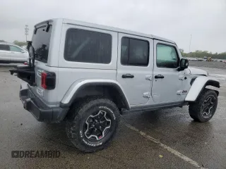 2023 Jeep Wrangler Rubicon with VIN 1C4JJXFM4PW589923, listed as a Copart auction lot 58725465 with 9,814 mi miles and Salvage title. Bid and sale history available at DreamBid. Image 3.