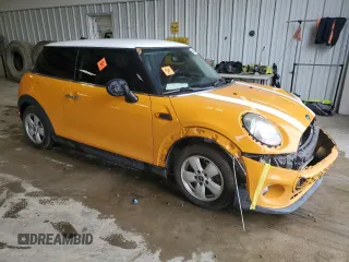 2017 MINI Hardtop Cooper with VIN WMWXP5C37H2D17030, listed as a Copart auction lot 54658275 with 144,308 mi miles and Salvage title. Bid and sale history available at DreamBid. Image 4.