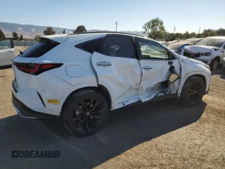 2022 Lexus NX with VIN JTJKKCFZ4N2006869, listed as a Copart auction lot 73743694 with 29,957 mi miles and Salvage Title. Bid and sale history available at carsss.com. Image 3.