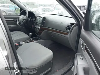 2011 Hyundai Santa Fe GLS z VIN 5XYZGDAB1BG027604, wystawiony jako IAAI lot #42219358 z przebiegiem 145 948 mil mil oraz . Historia ofert i sprzedaży dostępna na DreamBid. Obrazek 5.