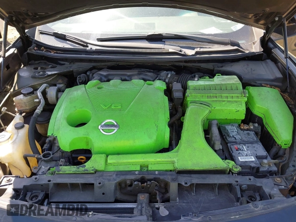 2014 Nissan Maxima S with VIN 1N4AA5AP0EC445232, listed as a IAAI auction lot 42154984 with 91,205 mi miles and . Bid and sale history available at DreamBid. Image 10.