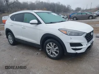 2019 Hyundai Tucson Value z VIN KM8J3CA43KU866751, wystawiony jako IAAI lot #41207494 z przebiegiem 64 992 mil mil oraz . Historia ofert i sprzedaży dostępna na DreamBid. Obrazek 1.