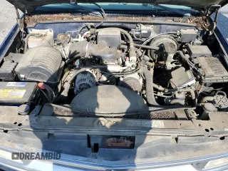 1999 Chevrolet Suburban with VIN 3GNEC16RXXG254126, listed as a Copart auction lot 52051405 with 113,554 mi miles and Clean title. Bid and sale history available at DreamBid. Image 12.