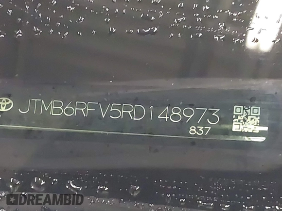 2024 Toyota RAV4 Hybrid XLE Premium with VIN JTMB6RFV5RD148973, listed as a IAAI auction lot 41516422 with 8,797 mi miles. Bid and sale history available at carsss.com. Image 9.
