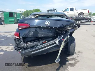 2021 Volkswagen Passat SE z VIN 1VWSA7A39MC002421, wystawiony jako IAAI lot #42097326 z przebiegiem 99 693 mil mil oraz . Historia ofert i sprzedaży dostępna na DreamBid. Obrazek 16.