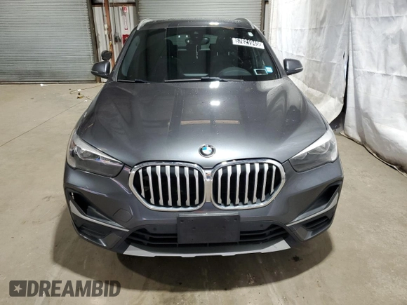 2021 BMW X1 xDrive28i with VIN WBXJG9C06M5S53321, listed as a Copart auction lot 57621945 with 49,668 mi miles and Clean title. Bid and sale history available at DreamBid. Image 5.